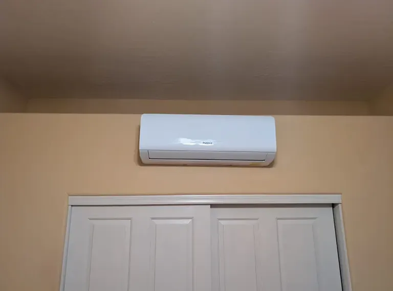 Ductless mini-split indoor unit mounted above a closet in Gilbert, AZ