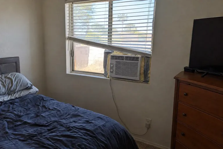 Bedroom window AC unit before the mini-split in Mesa, AZ